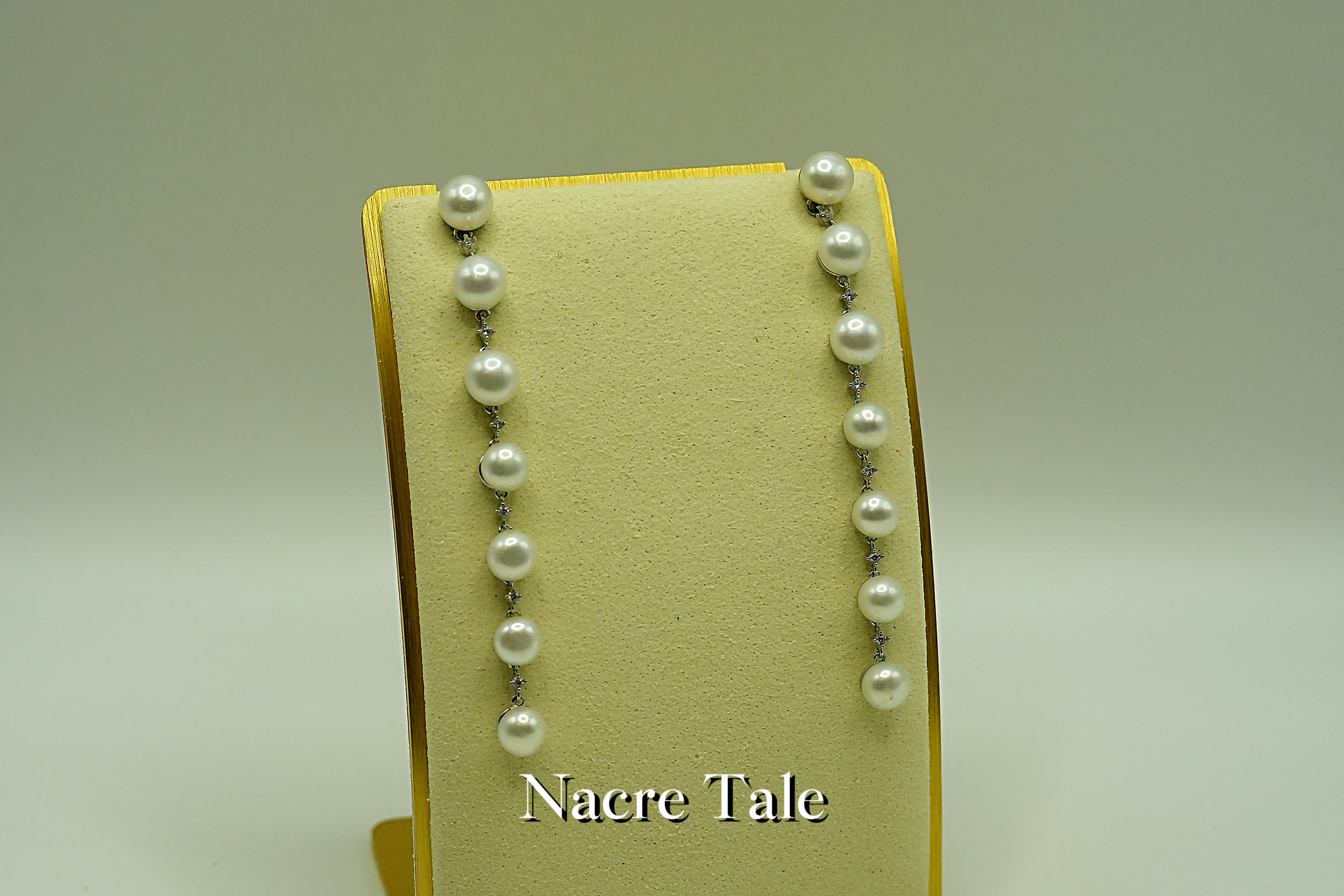 Nacre Tale Graduated Pearl Drop Earrings with Diamond Accents - Sterling Silver Elegance