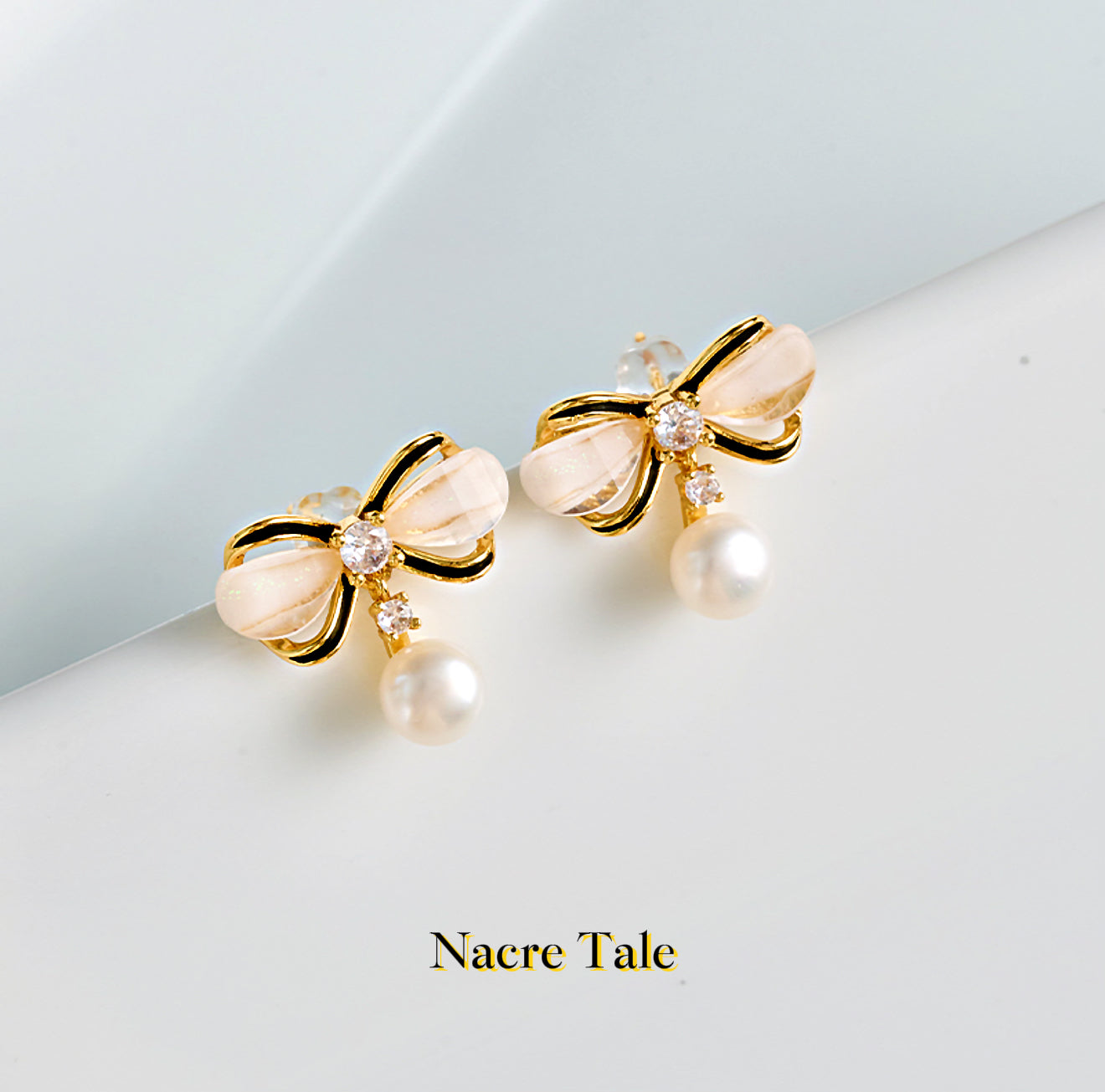 Nacre Tale Golden Bow Pearl Earrings - Crystal Accented Drop Earrings with Natural Pearls