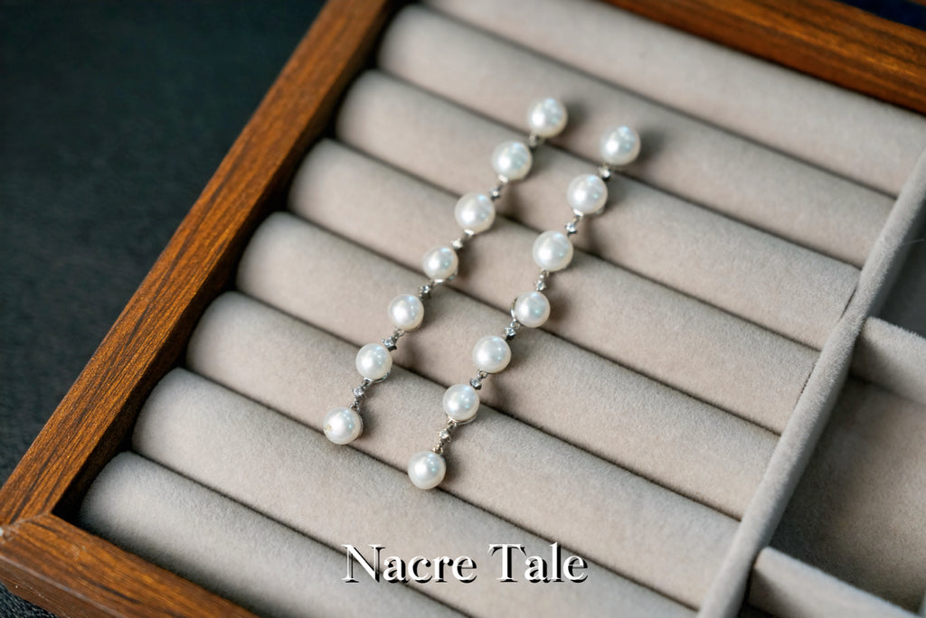 Nacre Tale Graduated Pearl Drop Earrings with Diamond Accents - Sterling Silver Elegance