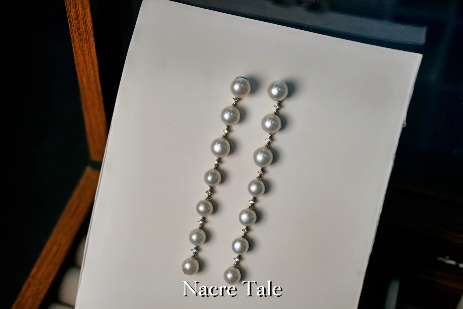 Nacre Tale Graduated Pearl Drop Earrings with Diamond Accents - Sterling Silver Elegance